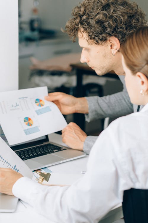 Private equity team reviewing deal intelligence and sector reports